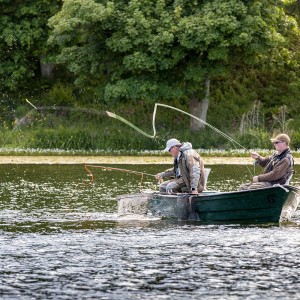 Trevor nets a fish as Gary...